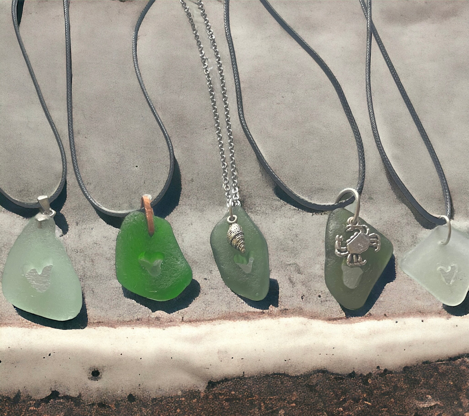 carved sea glass pendant