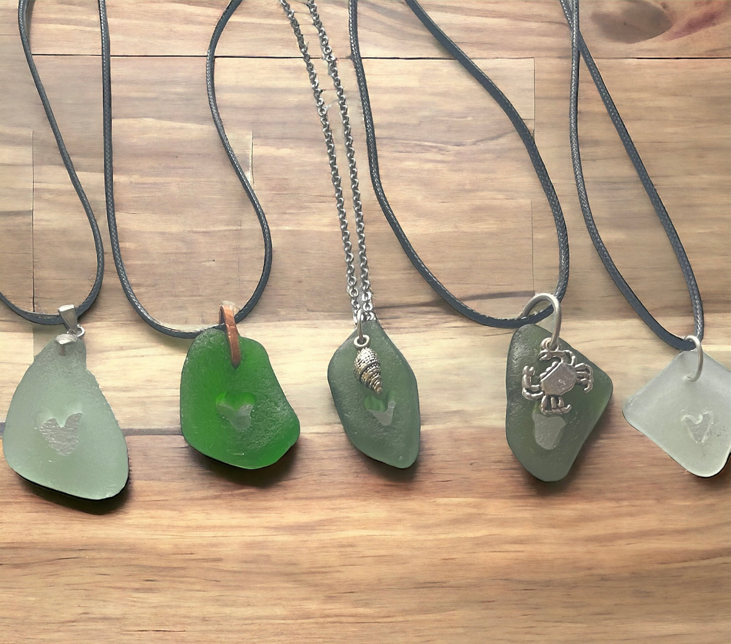 carved sea glass pendant