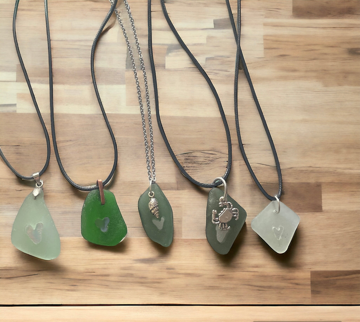 carved sea glass pendant